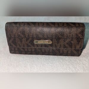 Michael Kors Jet Set monogram wallet.